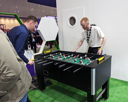 Alex beating Pavlos at foosball